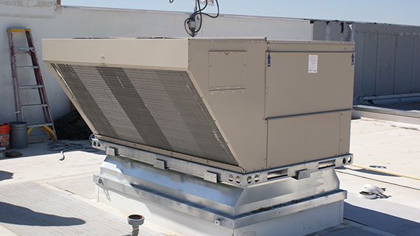 HVAC unit at a Walmart store, highlighting its design and installation on the building.